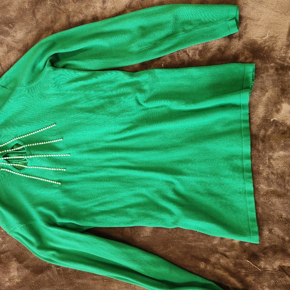 Beautiful blouse embellished with stones.